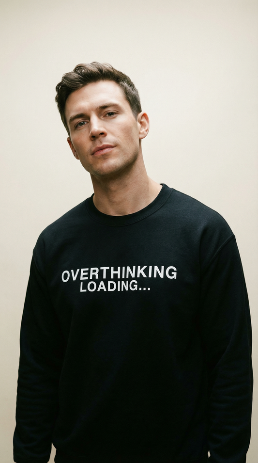 Black crewneck sweatshirt with white text "OVERTHINKING LOADING..."
