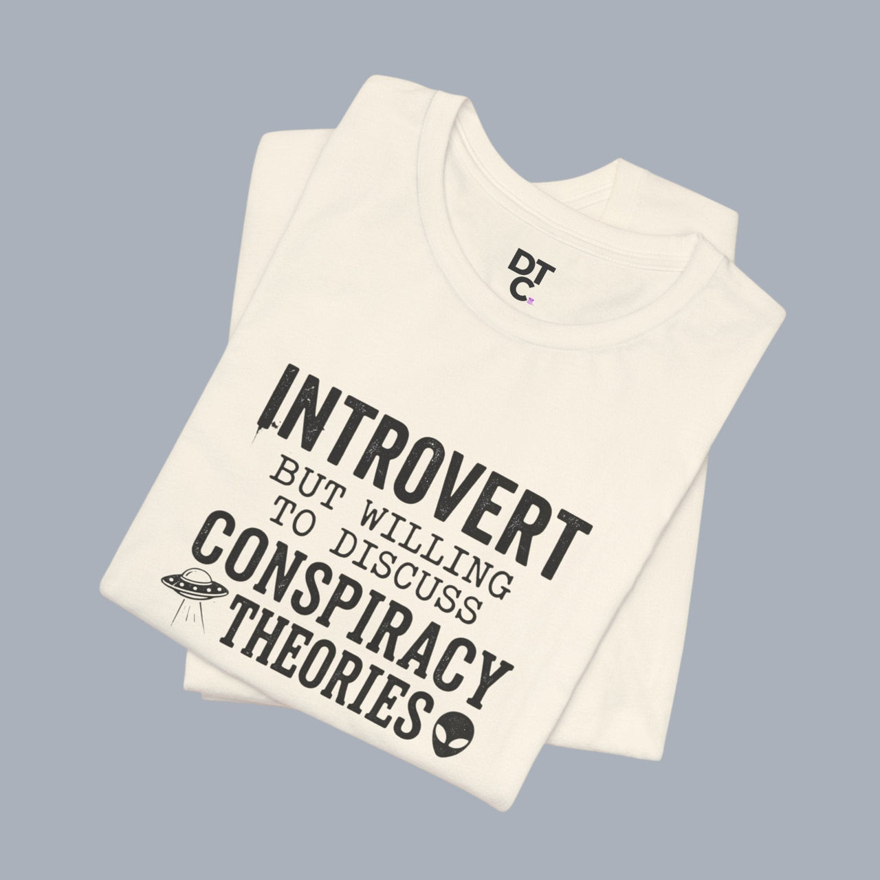 Introvert Tee — "Introvert But Willing to Discuss Conspiracy Theories" Funny Graphic T-Shirt