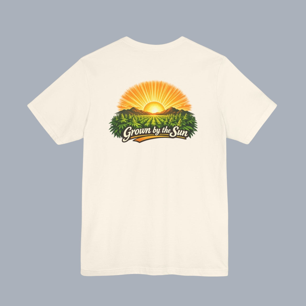 [Cream t-shirt with a sunrise graphic and text "Grown by the Sun"