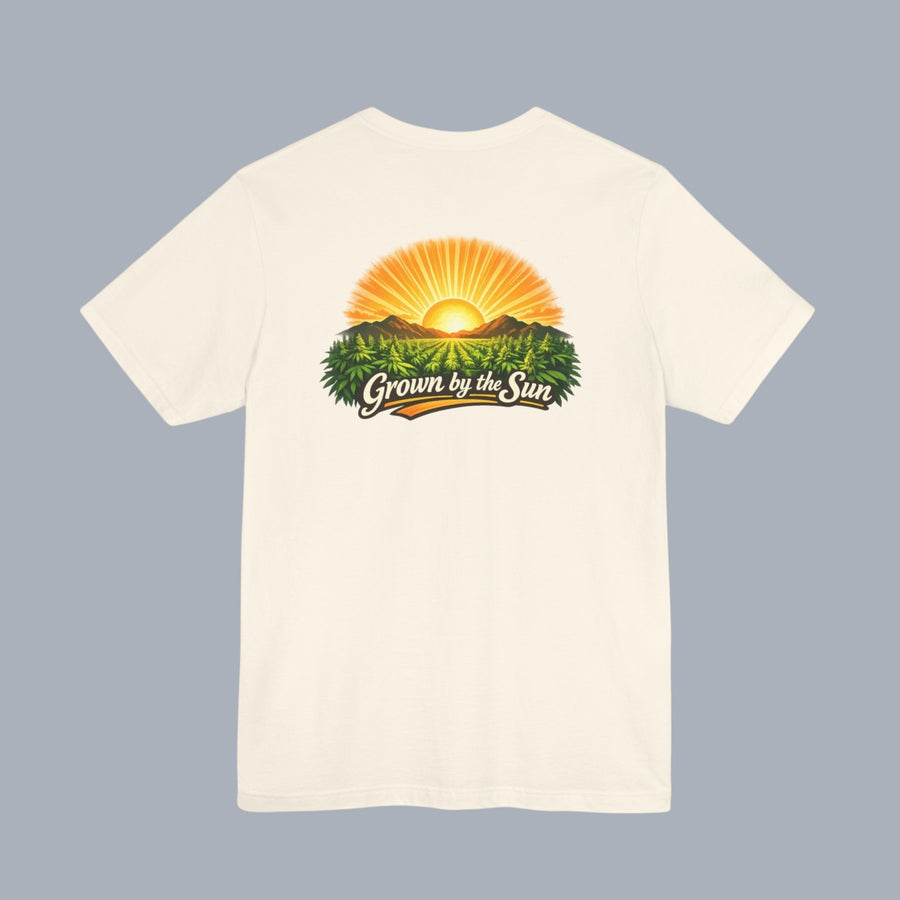 [Cream t-shirt with a sunrise graphic and text "Grown by the Sun"