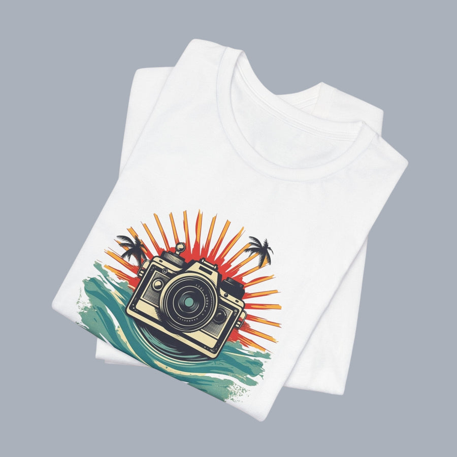 [Vintage camera graphic with sunset, waves, and palm trees
