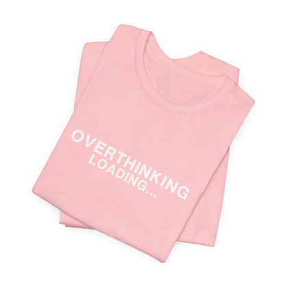 Pink t-shirt folded with "OVERTHINKING LOADING..." text