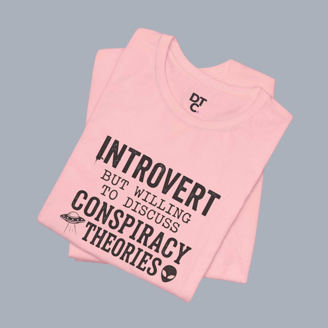 Introvert Tee — "Introvert But Willing to Discuss Conspiracy Theories" Funny Graphic T-Shirt