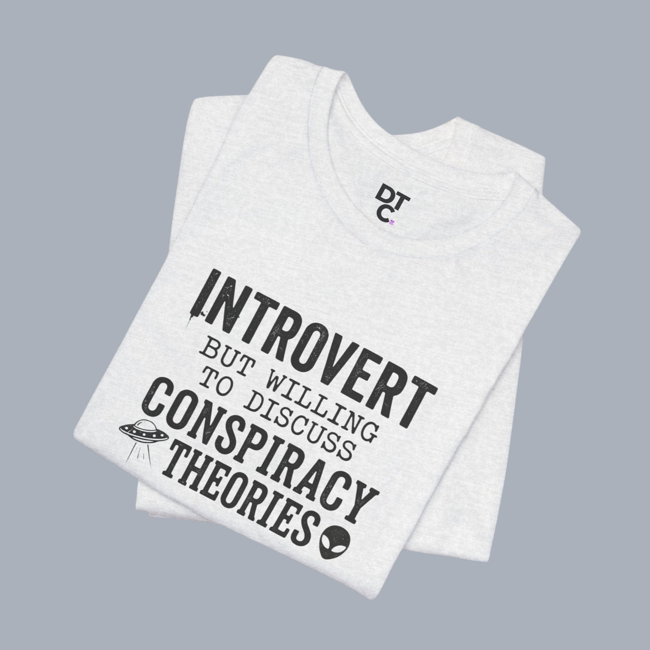 Introvert Tee — "Introvert But Willing to Discuss Conspiracy Theories" Funny Graphic T-Shirt