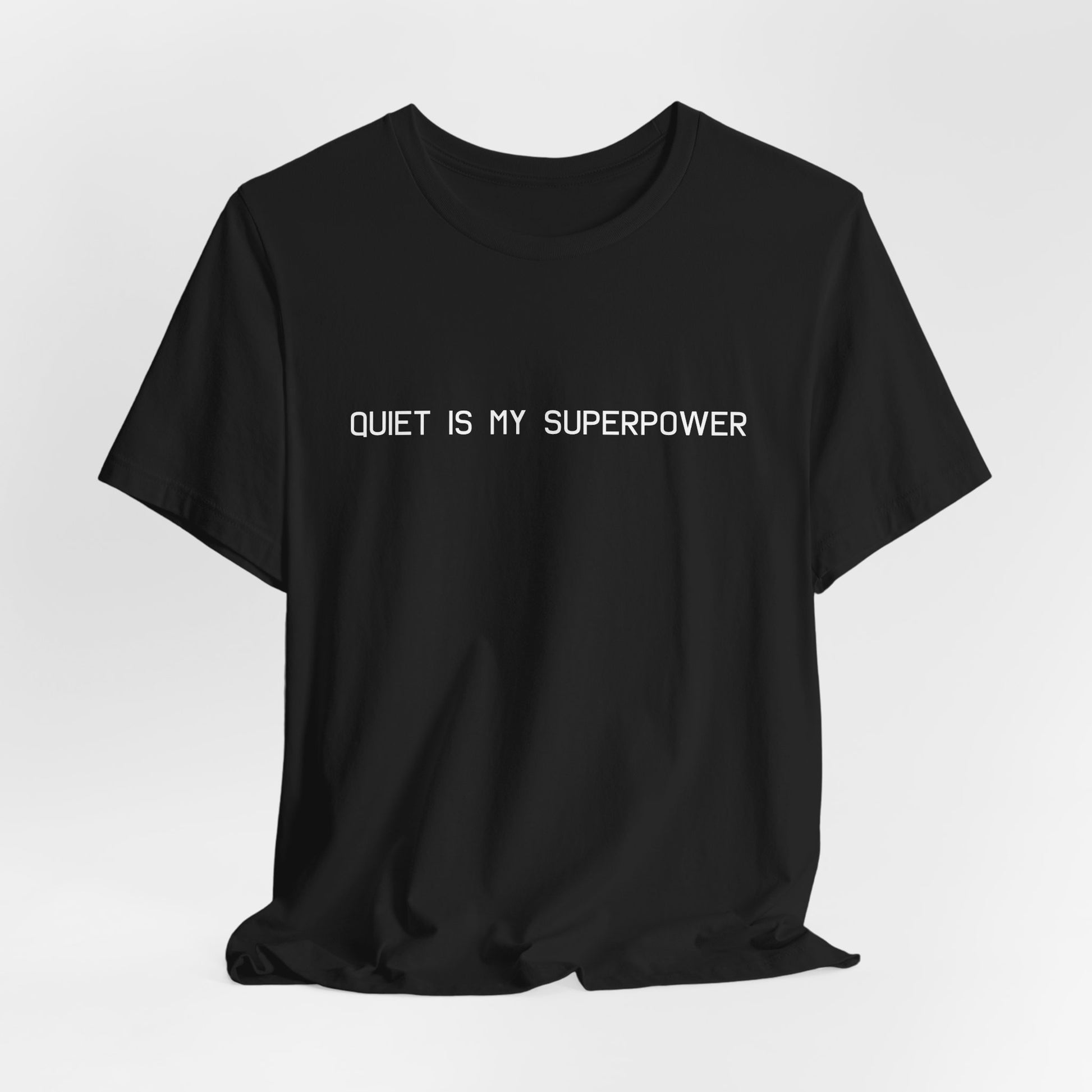 Black t-shirt with the text "QUIET IS MY SUPERPOWER" in white, minimalist design
