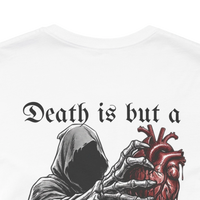 White 100% cotton t-shirt with a graphic of a hooded grim reaper holding a bloody anatomical heart and the text 