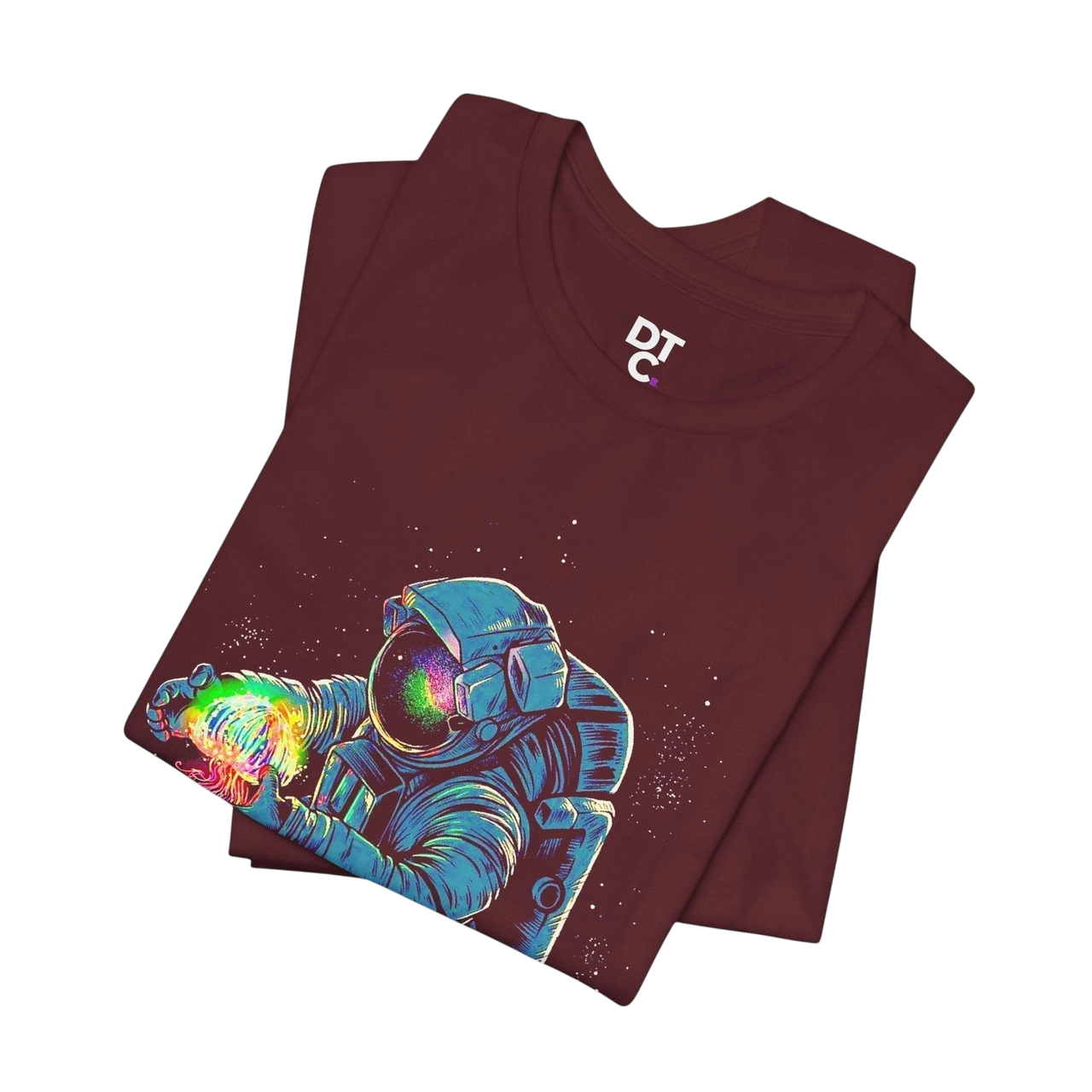 DailyThreadCo. maroon 100% cotton t-shirt with a graphic of an astronaut holding a rainbow nebula. Crew neck, short sleeves.