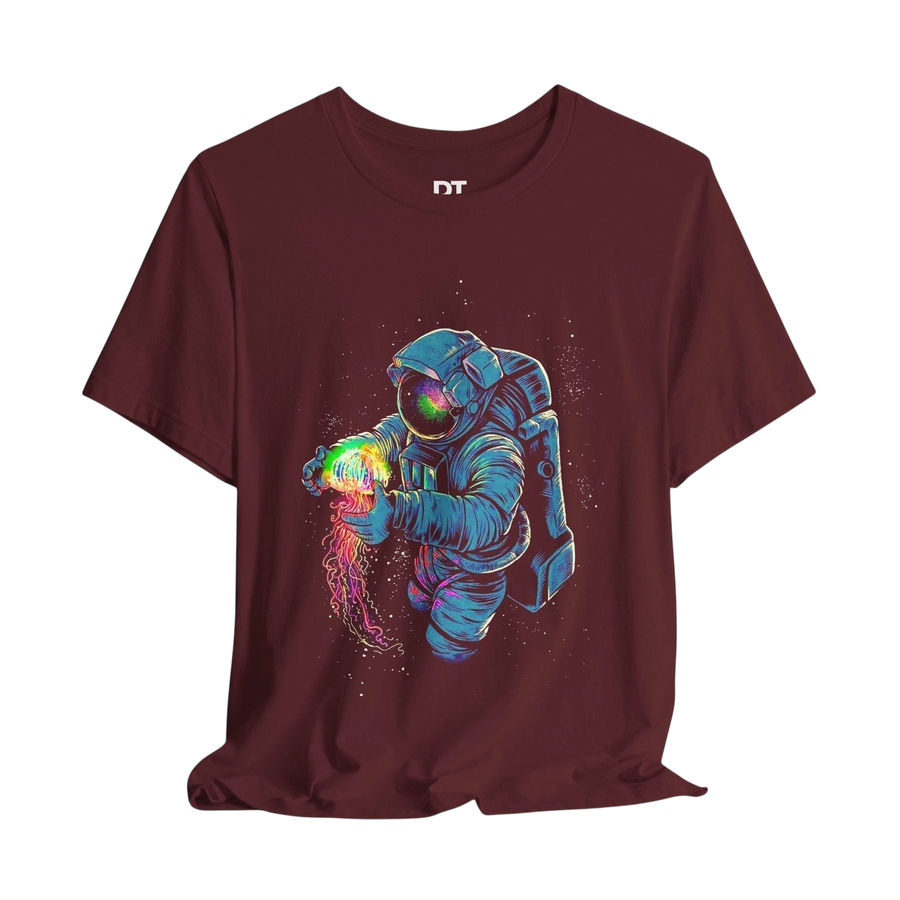DailyThreadCo. maroon 100% cotton t-shirt with astronaut graphic holding a colorful jellyfish.