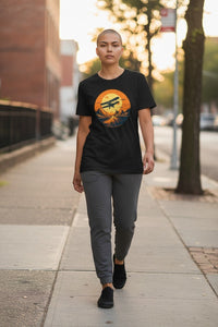 DailyThreadCo. black cotton t-shirt with a vintage biplane graphic over desert mesas at sunset.
