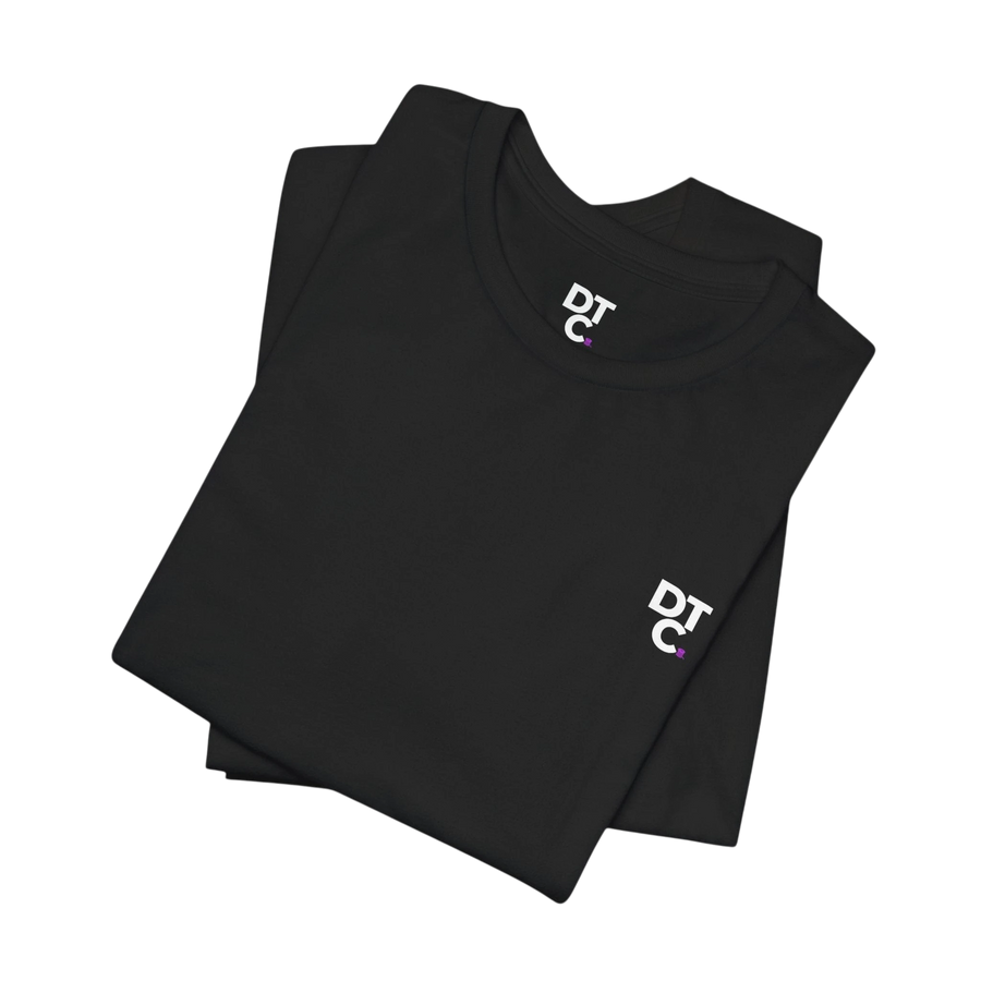 DailyThreadCo. black 100% cotton t-shirt with crew neck and small white DTCO logo on chest.