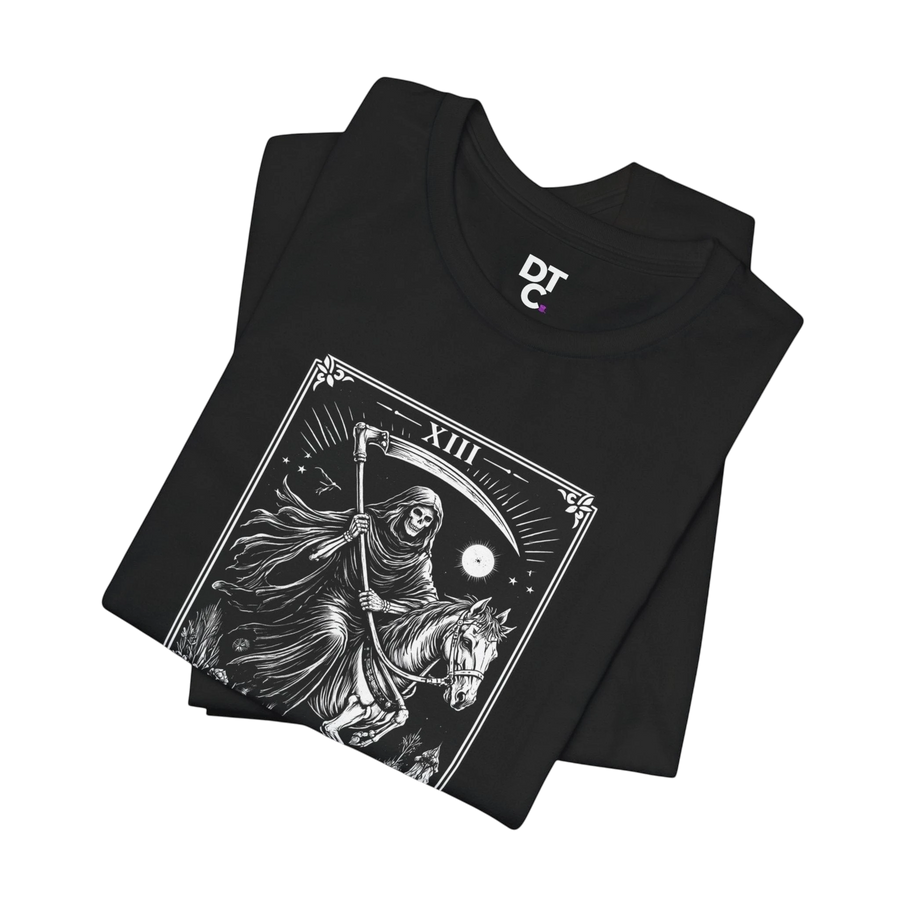 DailyThreadCo. black 100% cotton t-shirt with a monochrome Death Tarot card graphic featuring a skeleton on a horse, scythe, moon, and stars.