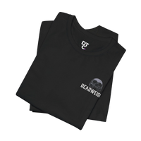 DailyThreadCo. black 100% cotton graphic t-shirt with a small chest print of a skull and the word 