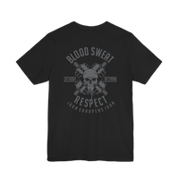 DailyThreadCo. black 100% cotton t-shirt with a graphic print of crossed barbells and a skull, featuring text 