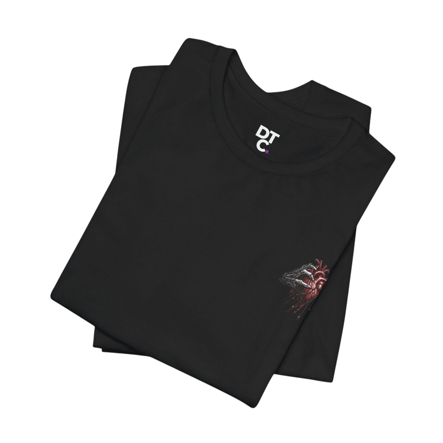 DailyThreadCo. black 100% cotton t-shirt with a small graphic of a skeletal hand holding a red anatomical heart on the left chest.
