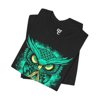 DailyThreadCo. black crew-neck t-shirt with a neon green owl graphic and yellow eyes, featuring a triangle symbol. 100% cotton.