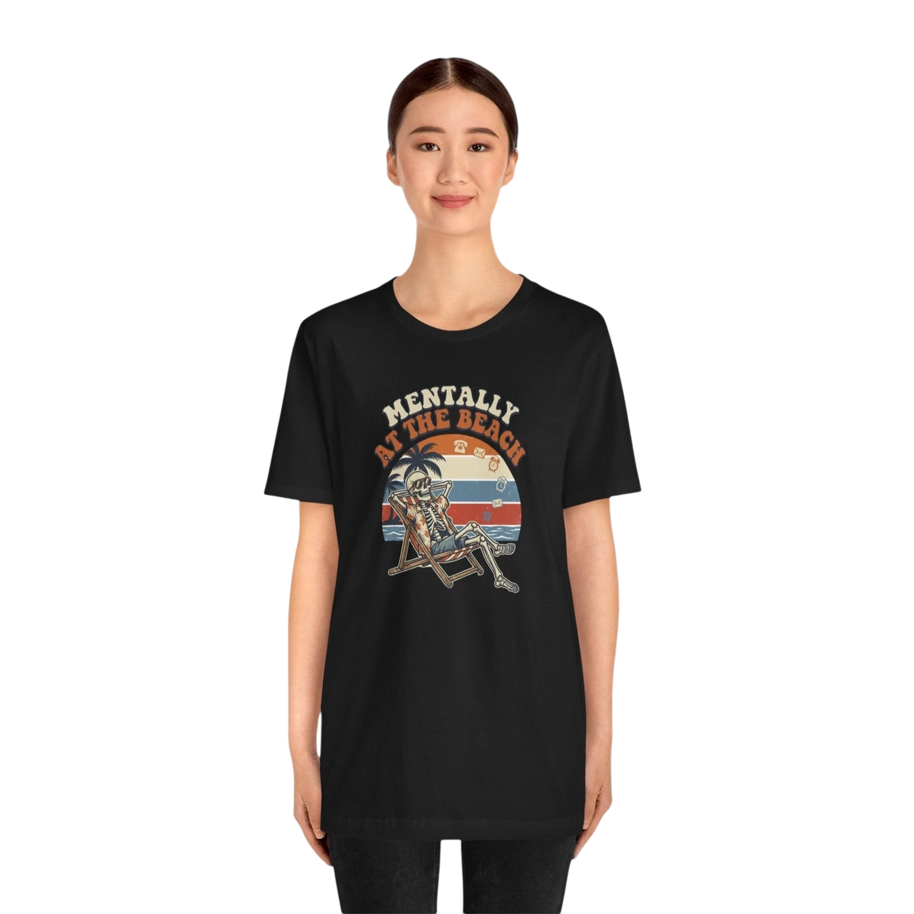 DailyThreadCo. black 100% cotton t-shirt with a retro graphic of a skeleton relaxing in a beach chair under palm trees with the text "Mentally at the Beach."
