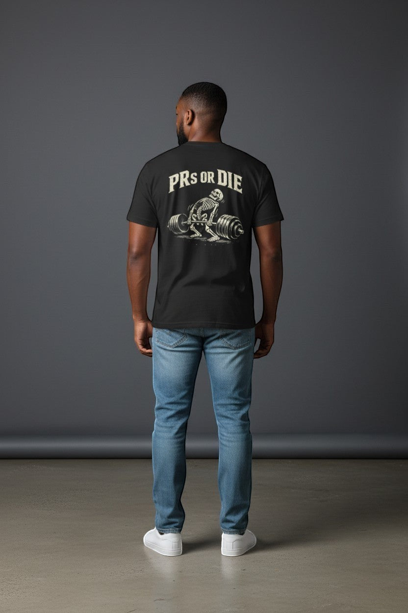 DailyThreadCo. black 100% cotton t-shirt with skeleton deadlifting graphic and "PRs or Die" text on back.