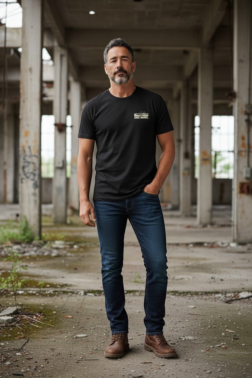 DailyThreadCo. black 100% Airlume cotton t-shirt with skeleton graphic on back and "ONE MORE" text, crew neck, short sleeves.