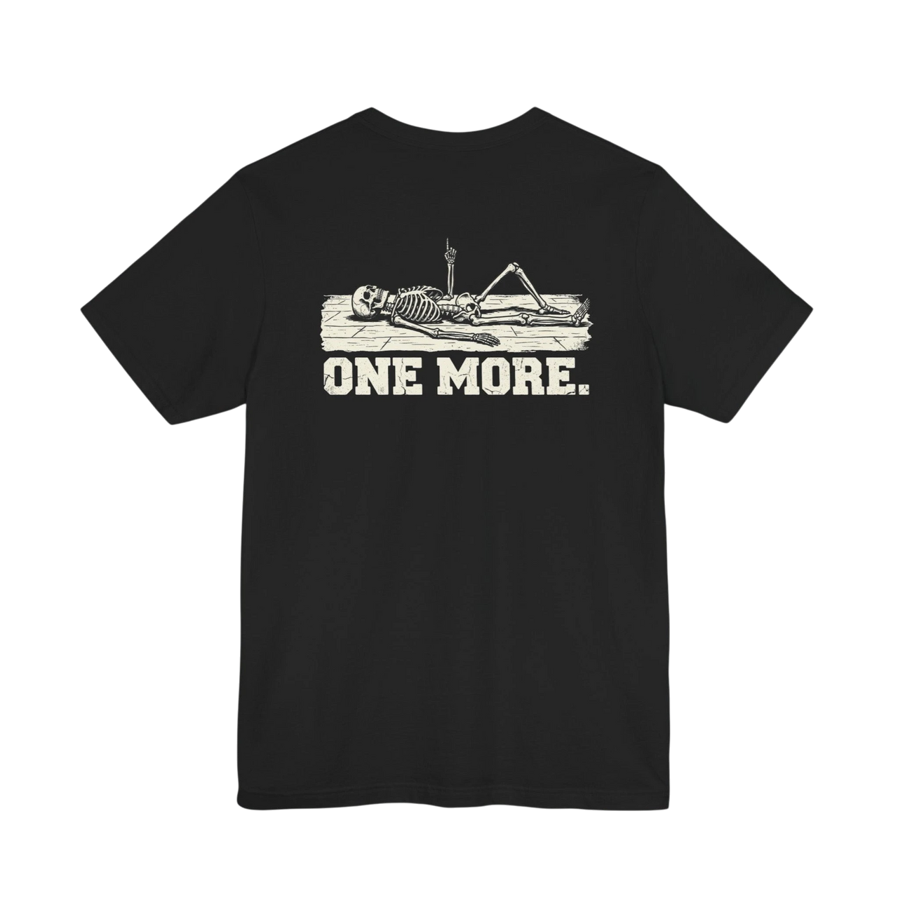 DailyThreadCo. black 100% Airlume cotton t-shirt with a graphic of a skeleton reclining on a board with the text "ONE MORE."