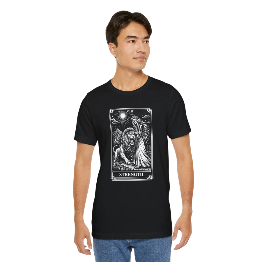 DailyThreadCo black 100% cotton crew neck t-shirt with vintage Strength tarot card illustration of a woman and lion.