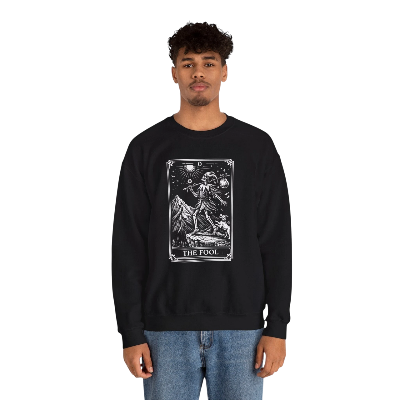DailyThreadCo. black crewneck sweatshirt with a vintage tarot card graphic of The Fool, featuring a mountain landscape and celestial symbols.