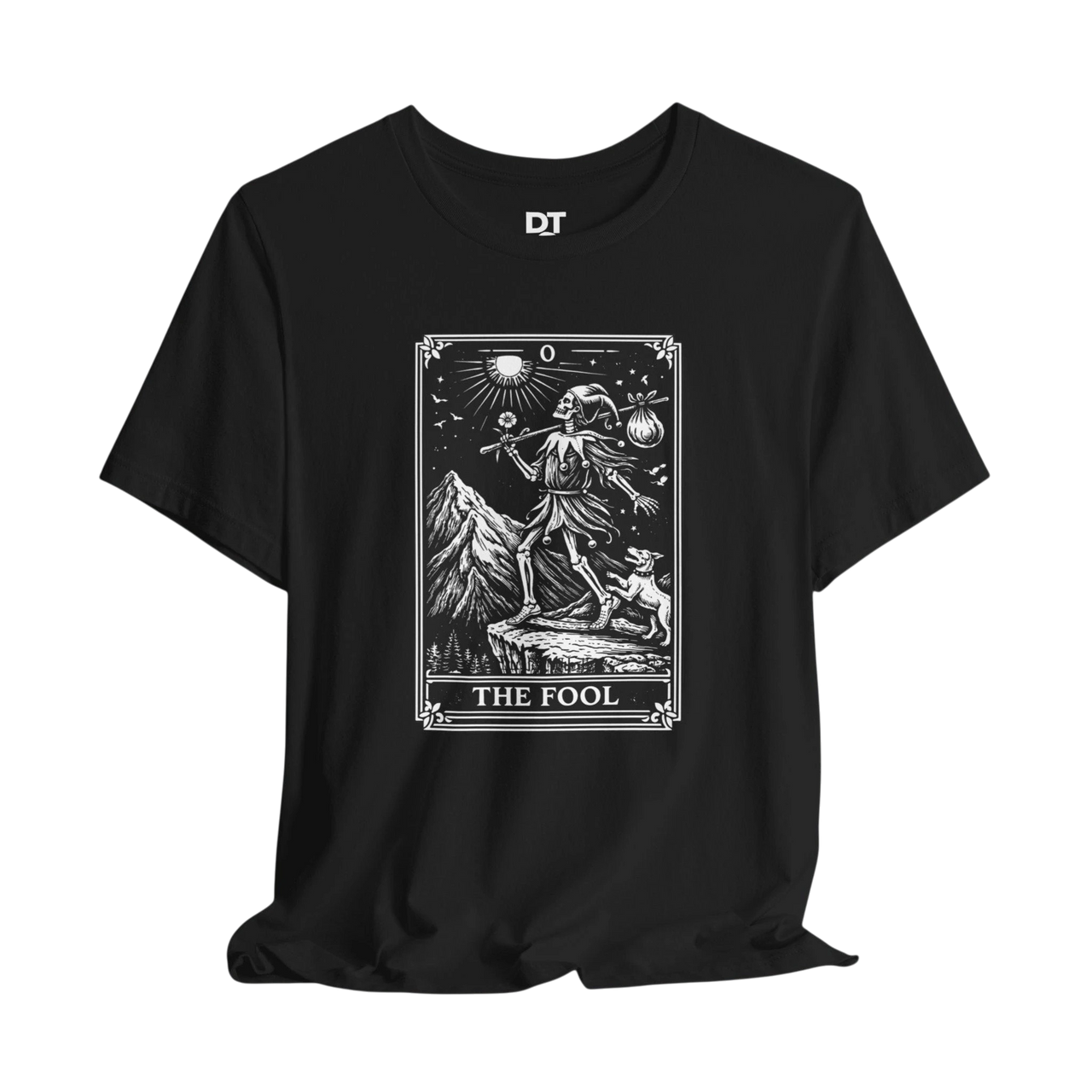DailyThreadCo. black 100% cotton t-shirt with 'The Fool' tarot card graphic. Features skeleton figure, dog, mountains, and sun.