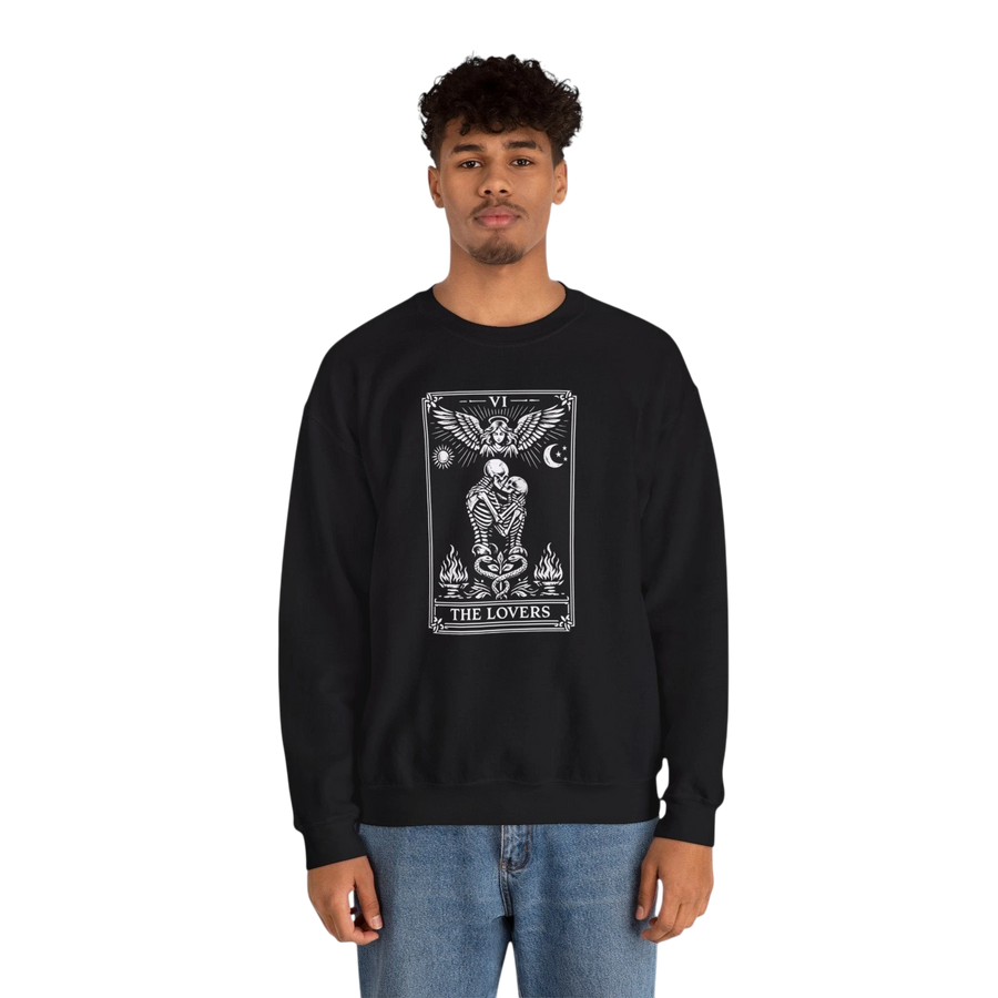 DailyThreadCo. black crewneck sweatshirt with 'The Lovers' tarot card graphic featuring skeleton figures, angelic wings, moon, and flames.