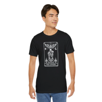 DailyThreadCo. black 100% cotton t-shirt with 'The Lovers' tarot card graphic in white monochrome. Features skeleton couple, angel, sun, moon, and flames.