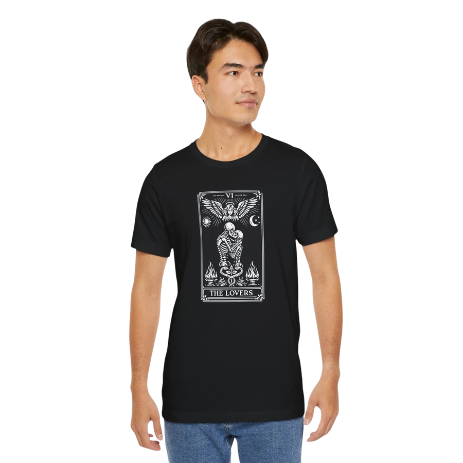 DailyThreadCo. black 100% cotton t-shirt with 'The Lovers' tarot card graphic in white monochrome. Features skeleton couple, angel, sun, moon, and flames.