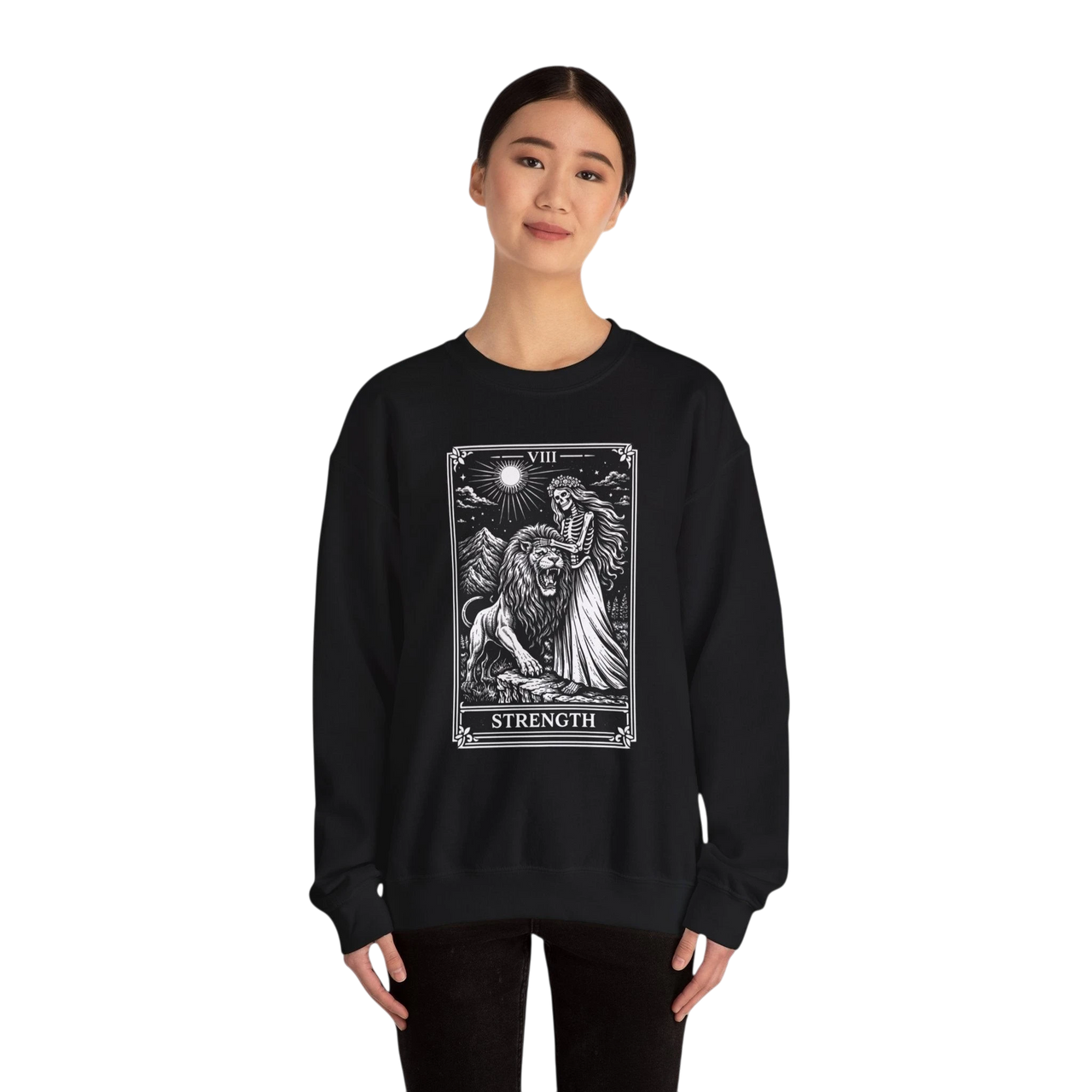 DailyThreadCo. black crewneck sweatshirt with a monochrome tarot strength card graphic featuring a woman and a lion.