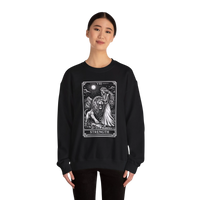 DailyThreadCo. black crewneck sweatshirt with a monochrome tarot strength card graphic featuring a woman and a lion.