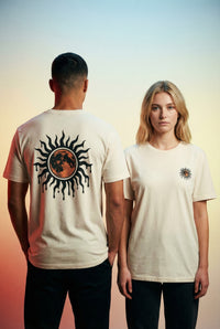 DailyThreadCo. cream cotton t-shirt with a celestial sun and moon graphic on the back and a smaller version on the chest.