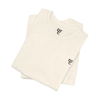 DailyThreadCo. cream 100% cotton crew neck t-shirt with small embroidered logo on chest and sleeve.