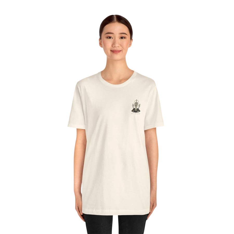 DailyThreadCo. cream 100% cotton t-shirt with a small gothic skeleton hand graphic on the chest.