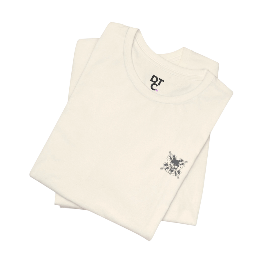 DailyThreadCo. cream cotton t-shirt with a small skull and crossed barbells graphic on the chest and a larger graphic on the back. Crew neck, short sleeves, retail fit.