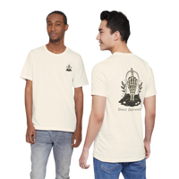 DailyThreadCo. cream 100% cotton t-shirt with a skeleton hand graphic on the back and small chest emblem. Muted rose color.