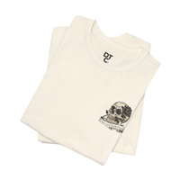DailyThreadCo. cream 100% cotton graphic tee with skull and rose artwork on chest. Crew neck, short sleeves.