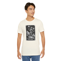 DailyThreadCo. cream cotton t-shirt with 'The Fool' tarot card graphic in black and white on the front.