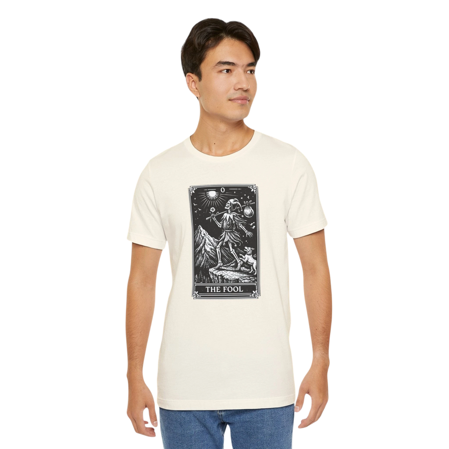 DailyThreadCo. cream cotton t-shirt with 'The Fool' tarot card graphic in black and white on the front.