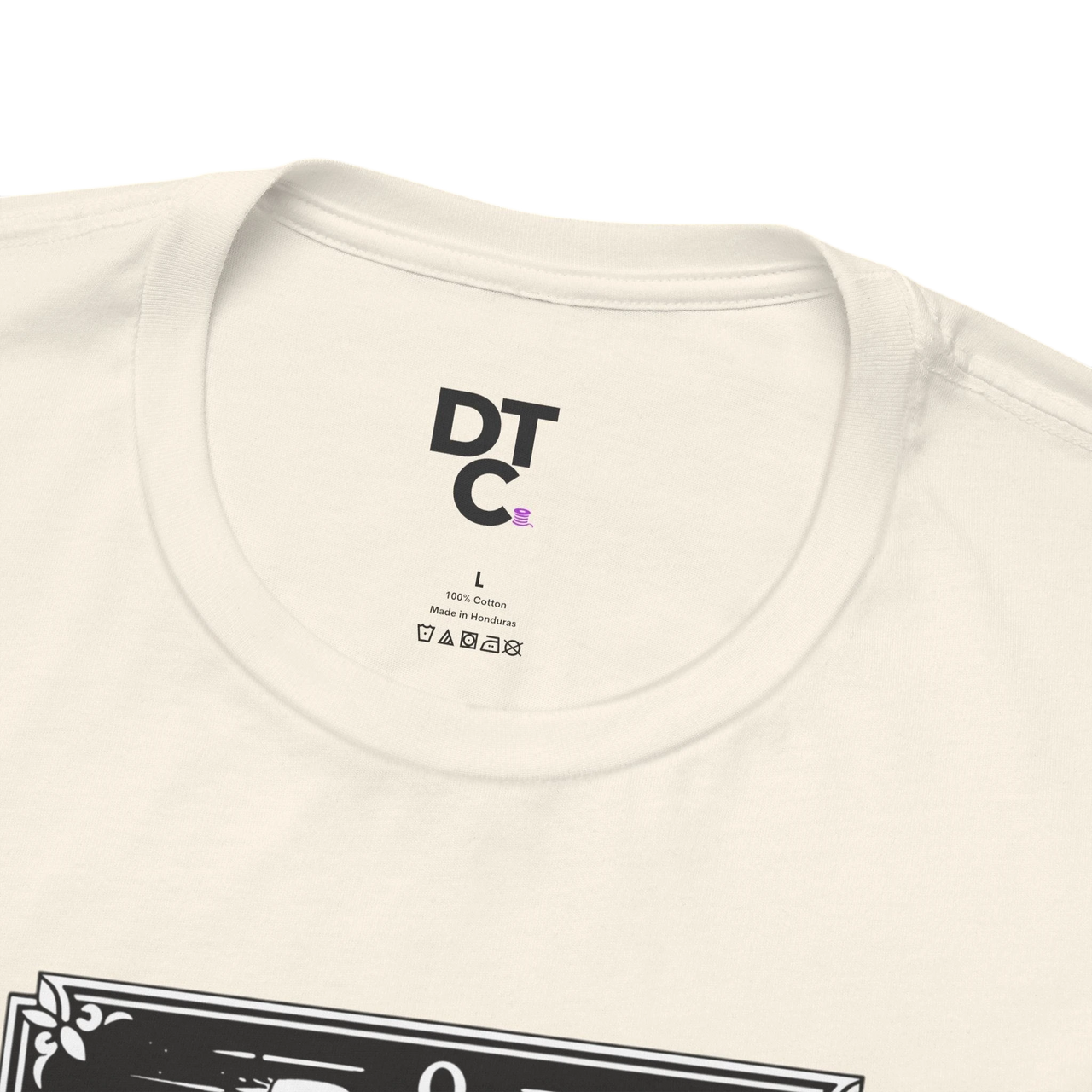 DailyThreadCo. cream 100% cotton crew neck t-shirt with 'The Fool' tarot card graphic on front.