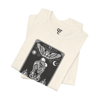 DailyThreadCo. cream 100% cotton t-shirt with black 'The Lovers' tarot card graphic. Features skeletons embracing under an angel.