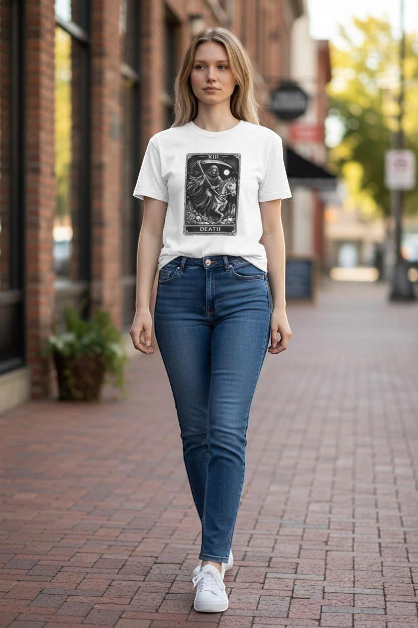 DailyThreadCo. white cotton t-shirt with a black and white Death Tarot card graphic. Features a skeleton on horseback and gothic details.