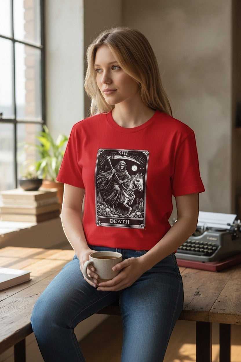 DailyThreadCo. red 100% cotton t-shirt with a black and white Death Tarot card graphic featuring a skeleton on a horse.