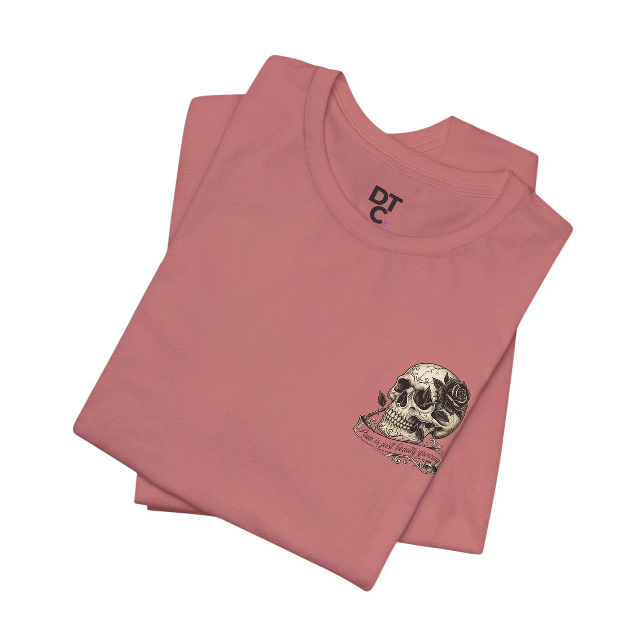 DailyThreadCo. dusty rose 100% cotton graphic tee with skull and rose artwork on the chest.