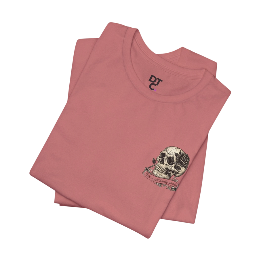 DailyThreadCo. dusty rose 100% cotton graphic tee with skull and rose artwork on the chest.