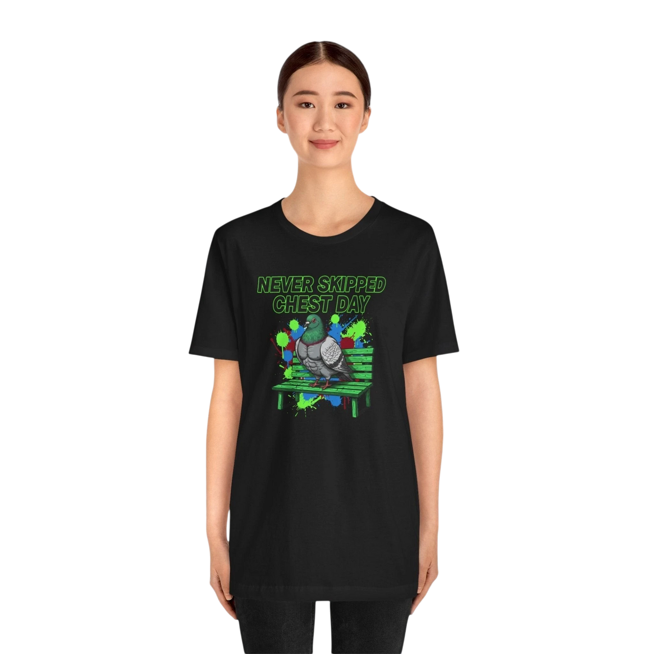DailyThreadCo. black cotton t-shirt with a graphic print of a pigeon on a bench, text reads "NEVER SKIPPED CHEST DAY".