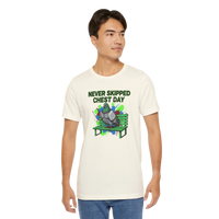 DailyThreadCo. cream cotton t-shirt with a graphic print of a muscular pigeon sitting on a green park bench. Text reads 