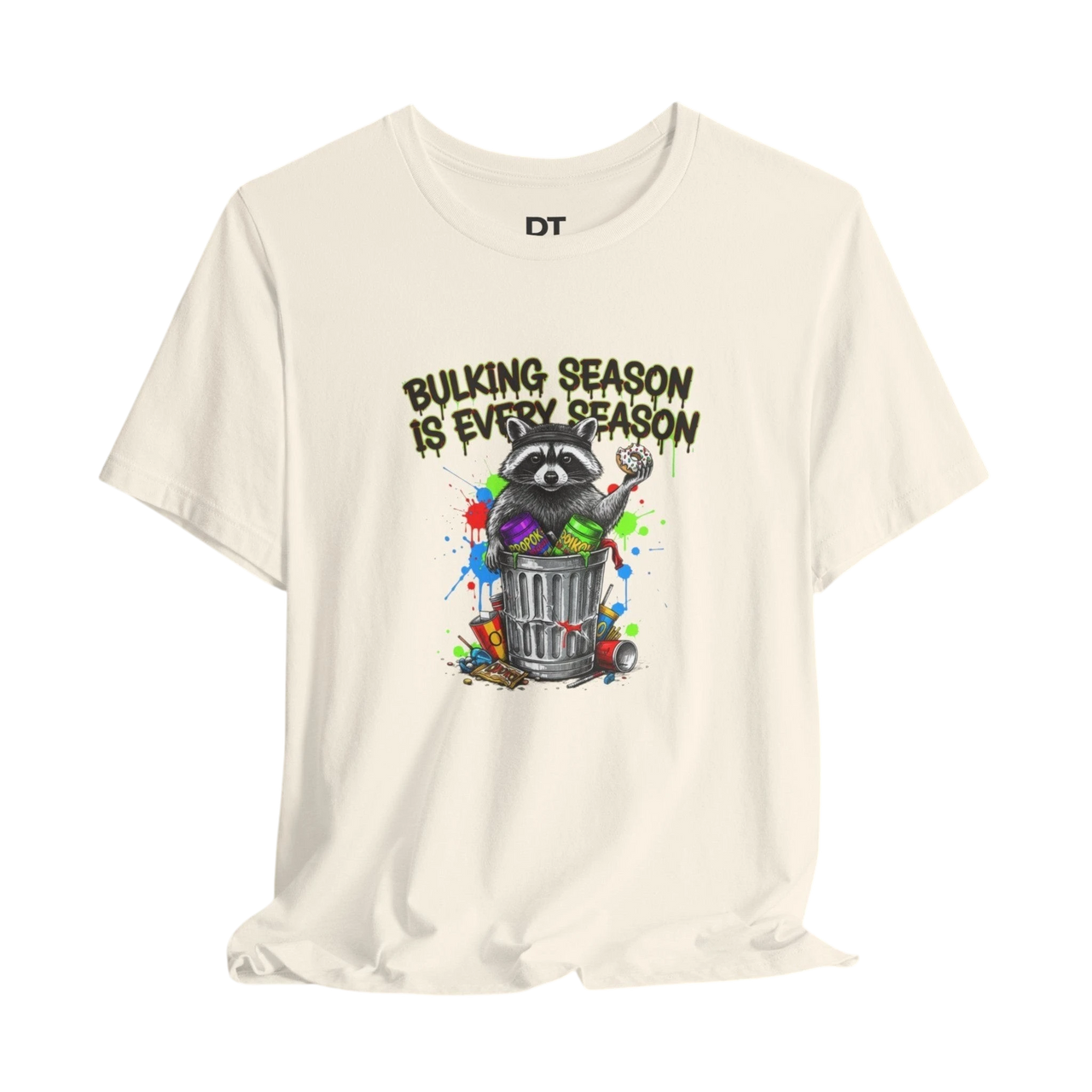 DailyThreadCo. cream 100% cotton t-shirt with a funny graphic of a raccoon in a trash can with the text "BULKING SEASON IS EVERY SEASON".