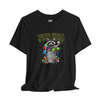 DailyThreadCo. black 100% cotton t-shirt with a funny graphic of a raccoon in a trash can, holding a donut, with colorful paint splatters and the text 