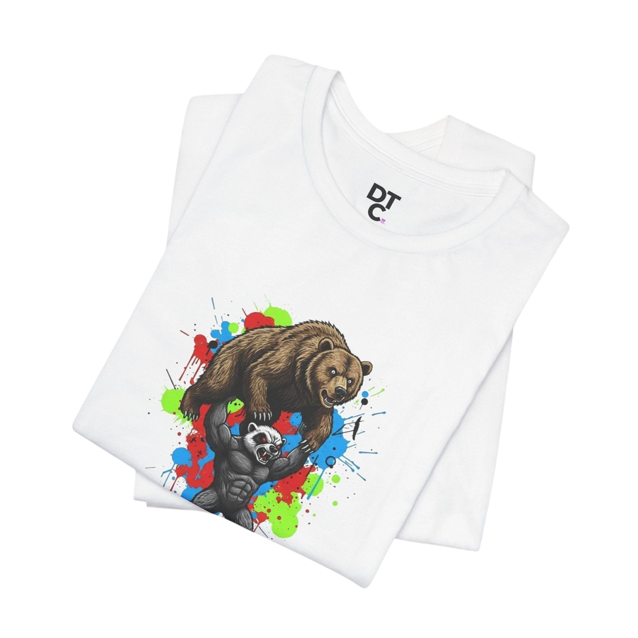 DailyThreadCo white 100% cotton t-shirt with a graphic of a honey badger lifting a bear, set against a colorful paint splash background.